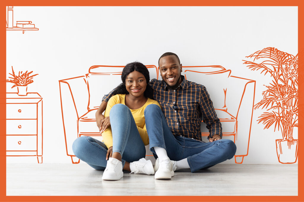 Couple sitting together in front of a minimalist illustration of a cozy living room, representing the emotional connection visuals create in credit union email marketing campaigns.