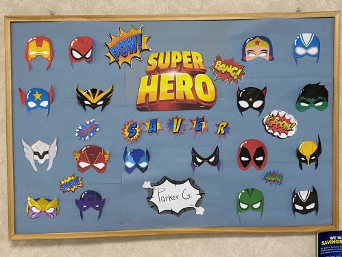 Pennstar Federal Credit Union's "Savings Superheroes" in-branch bulletin board displays showing off super heroes to promote youth savings accounts.